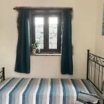 Le Decime Habitación en casa particular